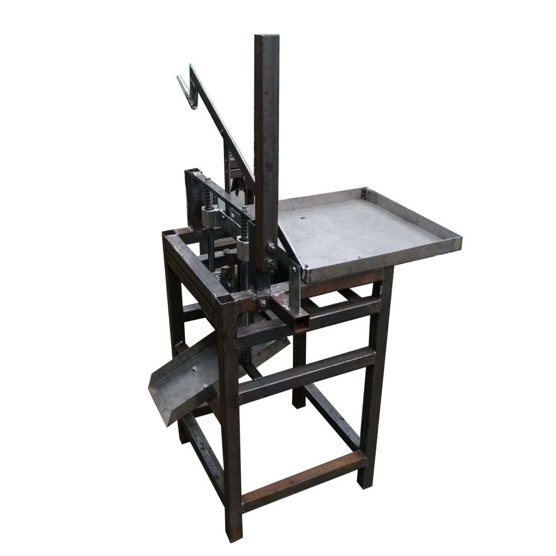 Vertical manual type cashew shell breaking machine