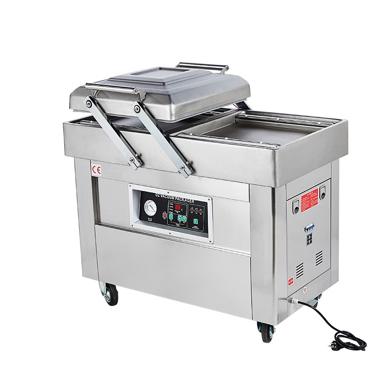 Double chamber vacuum packaging machine